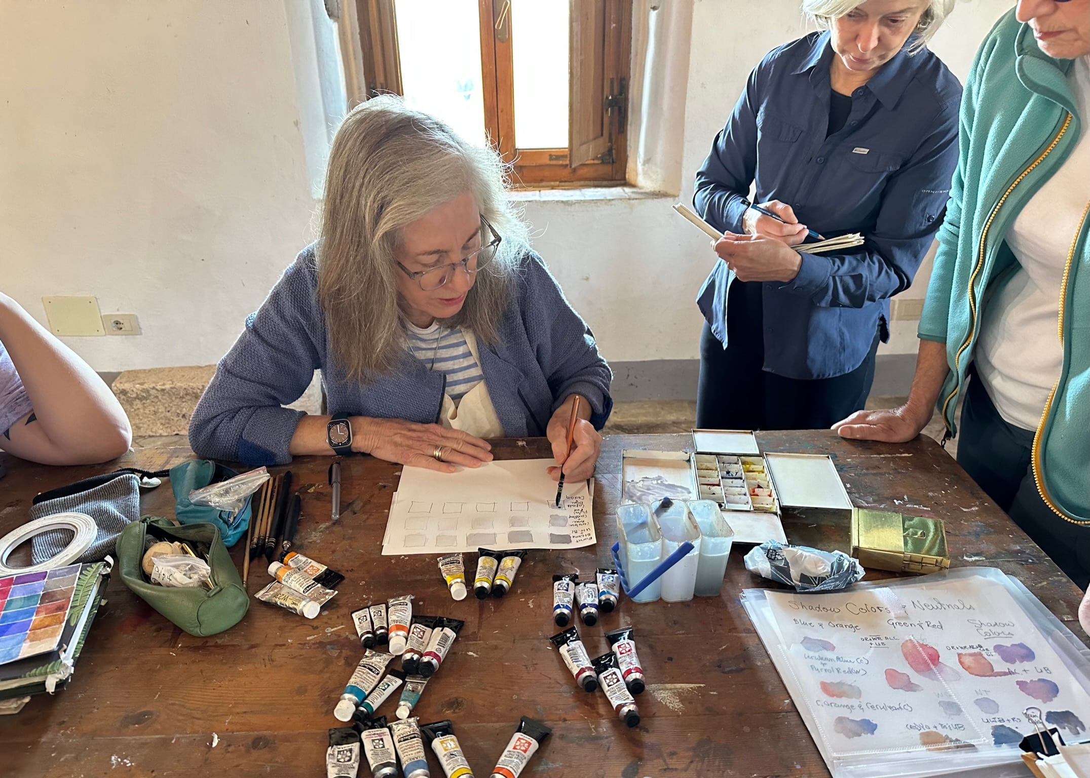 Linda Warner Constantino teaching painting